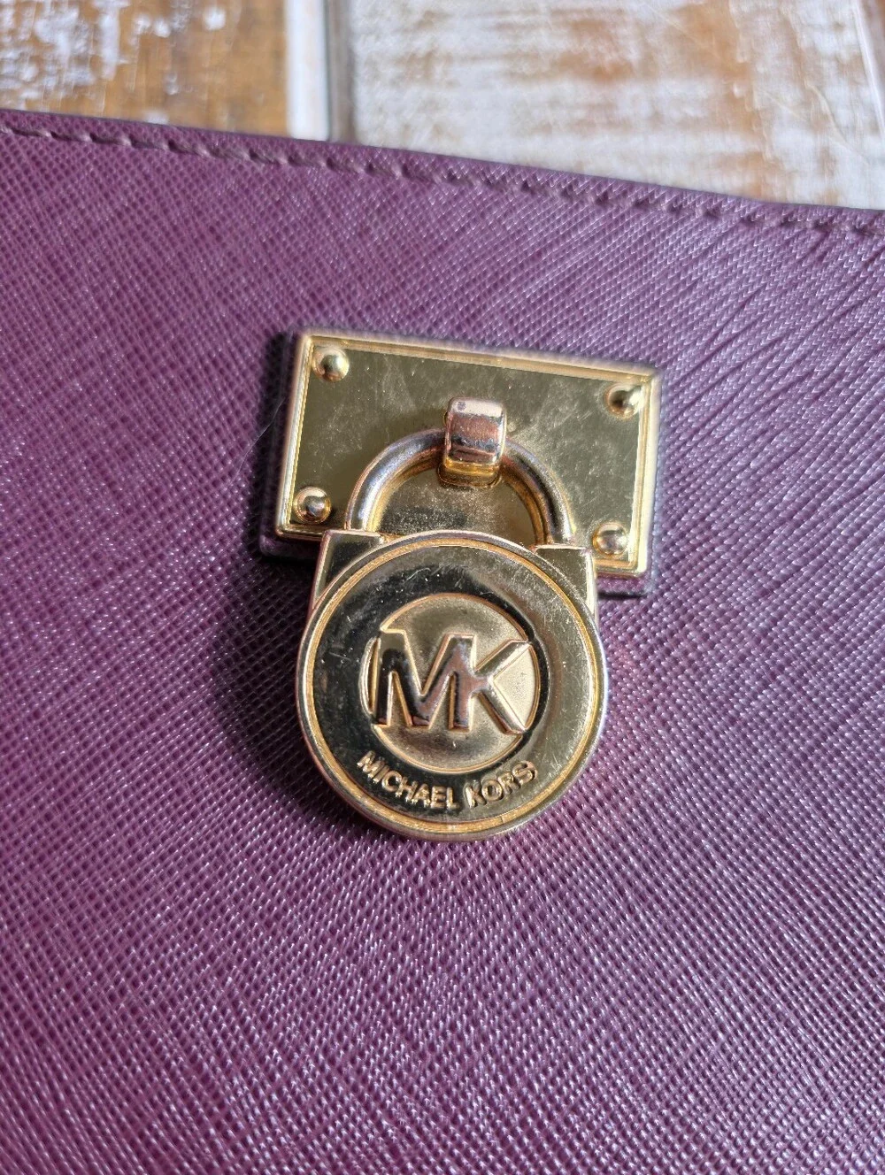 Michael Kors Plum Saffiano Zip Around Wallet with Gold Hardware